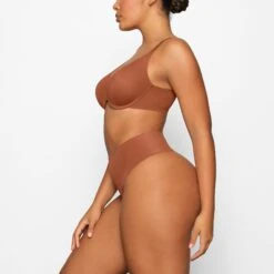SMOOTHING HIGH-WAISTED THONG | BRONZE -Underwear Specialty Shop SKIMS BRA BA PLG 2610 DA BRZ 0007 SD 22112aa9 f109 4cbe beb4 307254a44f02