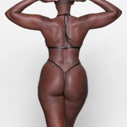 FAUX LEATHER STRING THONG | ONYX -Underwear Specialty Shop SKIMS PANTY PN STT 2213 UA ONX 0022 BK