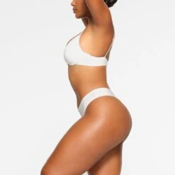 SHINE FOUNDATIONS THONG | MARBLE 9 SHINE FOUNDATIONS THONG | MARBLE -Underwear Specialty Shop SKIMS PANTY PN THG 2867 LA MBL 0013 SD x2 2a4142da 83d8 4286 8bb9 0175dbc679c6