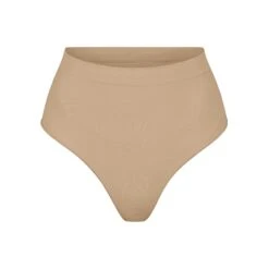 SEAMLESS SCULPT MID WAIST THONG | CLAY