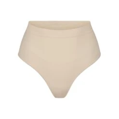 SEAMLESS SCULPT MID WAIST THONG | SAND