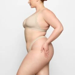 FITS EVERYBODY CORDED LACE DIPPED THONG | SAND -Underwear Specialty Shop SKIMS PANTY PN THG 4135 FC SND 0008 SD