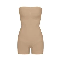 SEAMLESS SCULPT STRAPLESS SHORTIE BODYSUIT | CLAY
