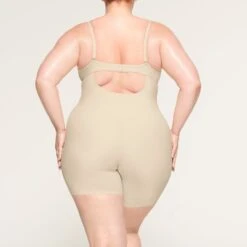 DEEP PLUNGE SHAPEWEAR MID THIGH BODYSUIT | SAND 11 DEEP PLUNGE SHAPEWEAR MID THIGH BODYSUIT | SAND -Underwear Specialty Shop SKIMS SHAPEWEAR BD MDT 2960 LD SND 0013