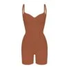 SEAMLESS SCULPT LOW BACK MID THIGH BODYSUIT | BRONZE 2 SEAMLESS SCULPT LOW BACK MID THIGH BODYSUIT | BRONZE -Underwear Specialty Shop SKIMS SHAPEWEAR BD MDT 3375 BRZ FRONTcopy