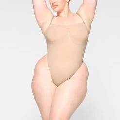 SEAMLESS SCULPT STRAPLESS THONG BODYSUIT | MICA -Underwear Specialty Shop SKIMS SHAPEWEAR BD THG 2913 JB MCA 0005 FR 92d79b57 424d 44df 8b33 5ad9368fda13