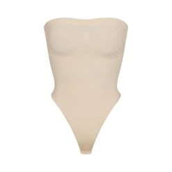 SEAMLESS SCULPT STRAPLESS THONG BODYSUIT | SAND