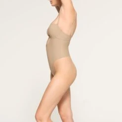 DEEP PLUNGE SHAPEWEAR BODYSUIT | CLAY 10 DEEP PLUNGE SHAPEWEAR BODYSUIT | CLAY -Underwear Specialty Shop SKIMS SHAPEWEAR BD THG 2959 LC CLY 0021