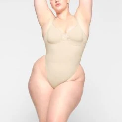 SEAMLESS SCULPT LOW BACK THONG BODYSUIT | SAND -Underwear Specialty Shop SKIMS SHAPEWEAR BD THG 3371 KC SND 0004 FR