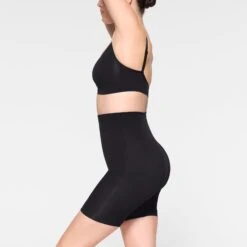 SEAMLESS SCULPT MID THIGH SHORT | ONYX -Underwear Specialty Shop SKIMS SHAPEWEAR BO SHO 3363 IE ONX 0009 SD
