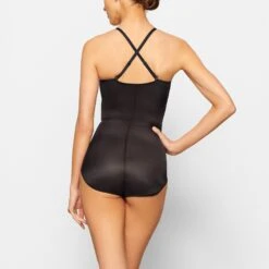 BARELY THERE BODYSUIT BRIEF W/ SNAPS | ONYX 12 BARELY THERE BODYSUIT BRIEF W/ SNAPS | ONYX -Underwear Specialty Shop SKIMS SHAPEWEAR SH BSB 1641 NB ONX BK2