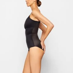 BARELY THERE BODYSUIT BRIEF W/ SNAPS | ONYX 10 BARELY THERE BODYSUIT BRIEF W/ SNAPS | ONYX -Underwear Specialty Shop SKIMS SHAPEWEAR SH BSB 1641 NB ONX SD
