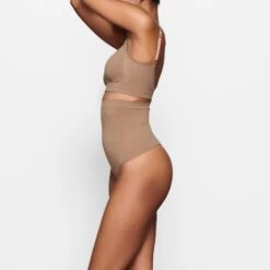 SEAMLESS SCULPT HIGH-WAISTED THONG | SIENNA -Underwear Specialty Shop SKIMS SHAPEWEAR SH HWT 0119 MA SIE SD f223a924 24d6 42a4 a2ad 8cbf1ae58a66