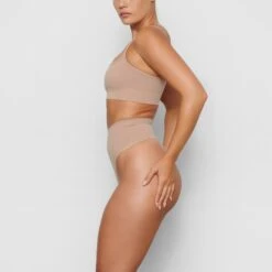 SEAMLESS SCULPT MID WAIST THONG | CLAY -Underwear Specialty Shop SKIMS SHAPEWEAR SH MWT 0198 AZ CLY SD 1c7b88f4 4e16 4c74 943d 3d0ec56e26ca